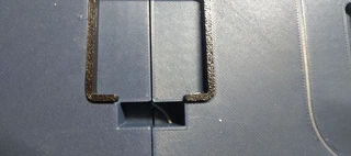 The collar frame glued around the central square cutout in the base plate.